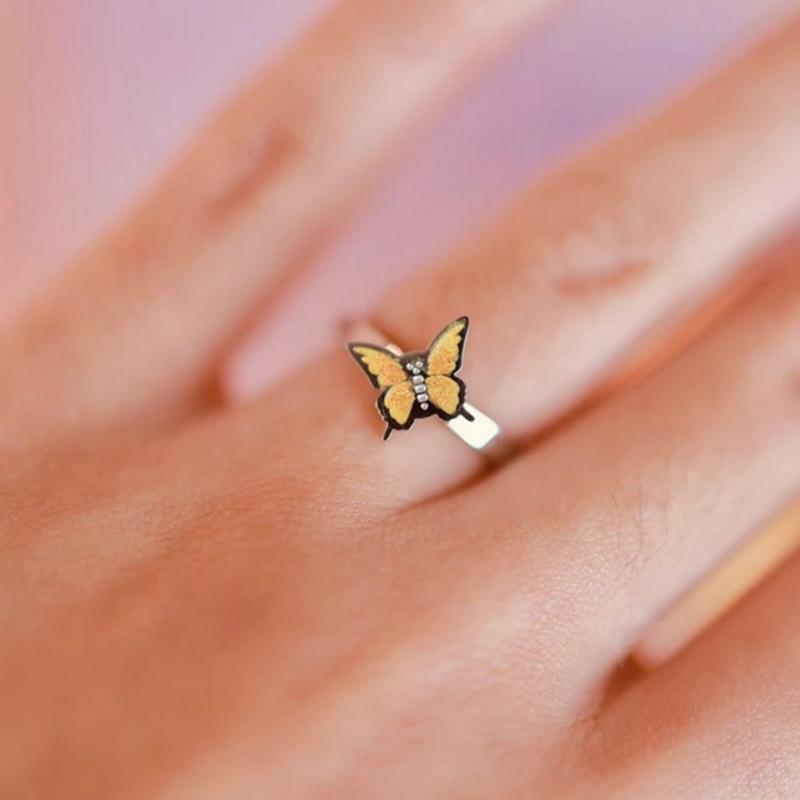 Bague Rotative Marguerite/Papillon
